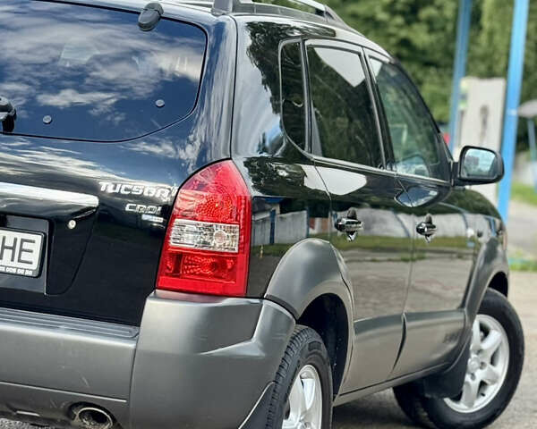 Чорний Хендай Туксон, об'ємом двигуна 2 л та пробігом 225 тис. км за 8500 $, фото 14 на Automoto.ua