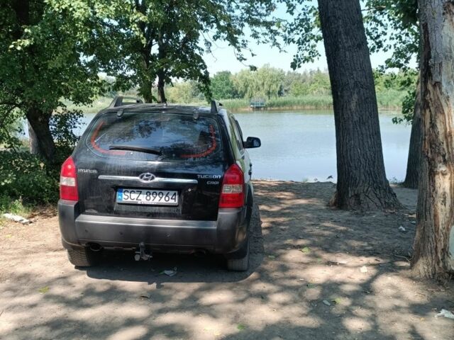 Чорний Хендай Туксон, об'ємом двигуна 2 л та пробігом 280 тис. км за 4127 $, фото 1 на Automoto.ua
