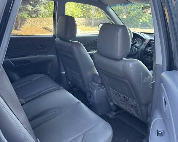 Хендай Туксон 2005 у Вознесенске на Automoto.ua Чорний Хендай Туксон, об'ємом двигуна 1.98 л та пробігом 144 тис. км за 7500 $, фото 11 на Automoto.ua