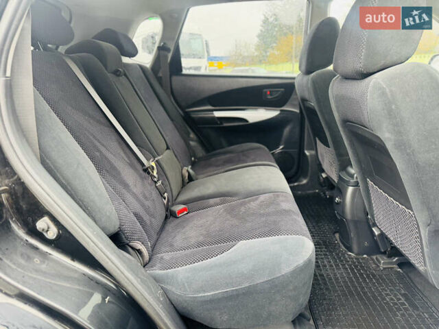 Черный Хендай Туксон, объемом двигателя 1.98 л и пробегом 252 тыс. км за 7300 $, фото 20 на Automoto.ua