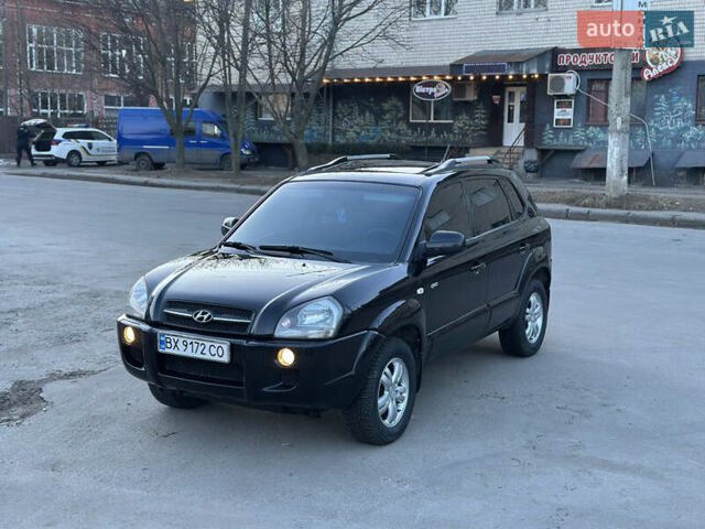 Черный Хендай Туксон, объемом двигателя 2 л и пробегом 245 тыс. км за 7950 $, фото 14 на Automoto.ua