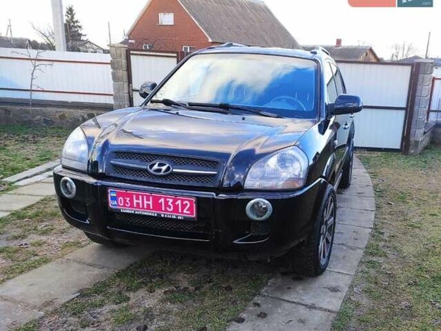 Черный Хендай Туксон, объемом двигателя 2 л и пробегом 208 тыс. км за 6950 $, фото 2 на Automoto.ua