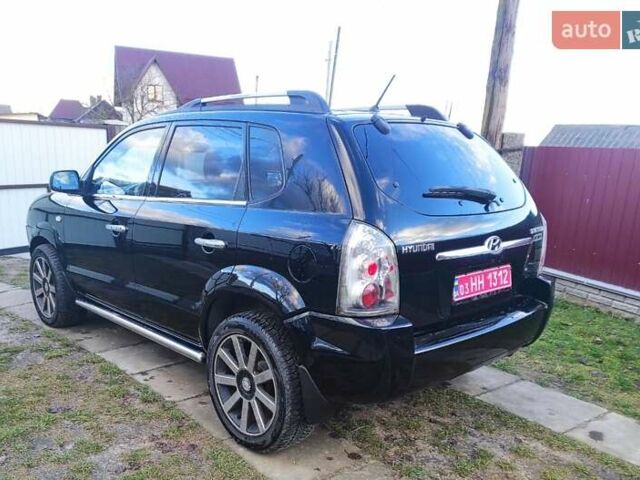 Черный Хендай Туксон, объемом двигателя 2 л и пробегом 208 тыс. км за 6950 $, фото 42 на Automoto.ua