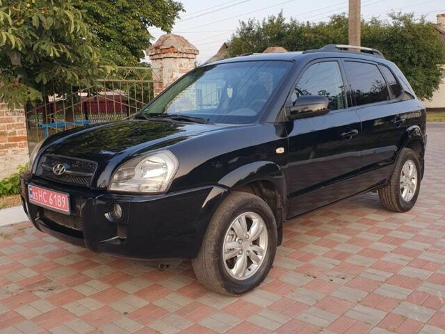 Черный Хендай Туксон, объемом двигателя 2 л и пробегом 137 тыс. км за 7499 $, фото 2 на Automoto.ua