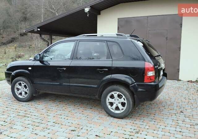 Чорний Хендай Туксон, об'ємом двигуна 1.98 л та пробігом 213 тис. км за 7500 $, фото 2 на Automoto.ua
