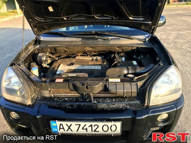 Хендай Туксон 2005 в Первомайском на Automoto.ua Черный Хендай Туксон, объемом двигателя 2 л и пробегом 253 тыс. км за 7700 $, фото 4 на Automoto.ua