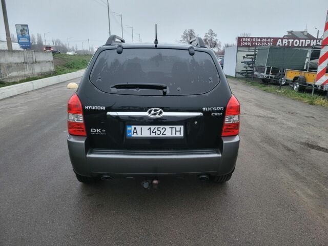 Черный Хендай Туксон, объемом двигателя 2 л и пробегом 180 тыс. км за 4500 $, фото 4 на Automoto.ua