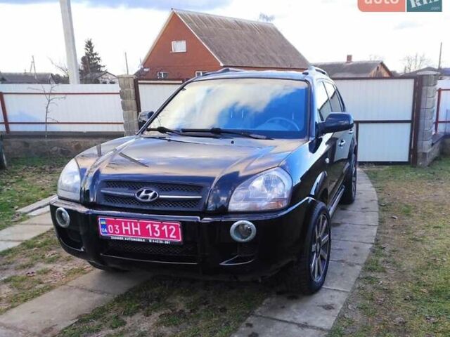 Черный Хендай Туксон, объемом двигателя 2 л и пробегом 208 тыс. км за 6950 $, фото 47 на Automoto.ua