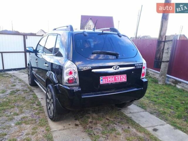 Черный Хендай Туксон, объемом двигателя 2 л и пробегом 208 тыс. км за 6950 $, фото 40 на Automoto.ua