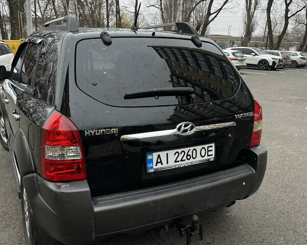 Чорний Хендай Туксон, об'ємом двигуна 1.98 л та пробігом 225 тис. км за 6600 $, фото 9 на Automoto.ua