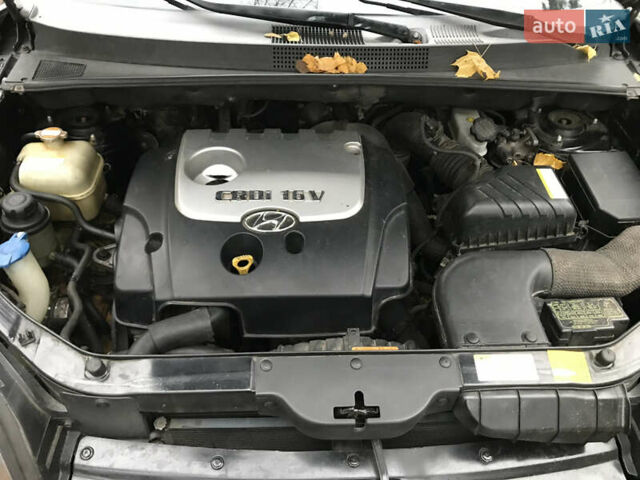 Черный Хендай Туксон, объемом двигателя 2 л и пробегом 261 тыс. км за 6500 $, фото 16 на Automoto.ua