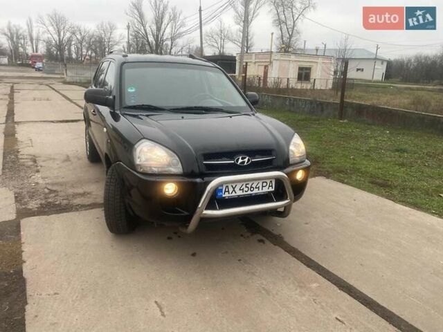 Черный Хендай Туксон, объемом двигателя 2 л и пробегом 190 тыс. км за 7500 $, фото 15 на Automoto.ua