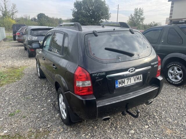 Чорний Хендай Туксон, об'ємом двигуна 2 л та пробігом 270 тис. км за 3500 $, фото 3 на Automoto.ua