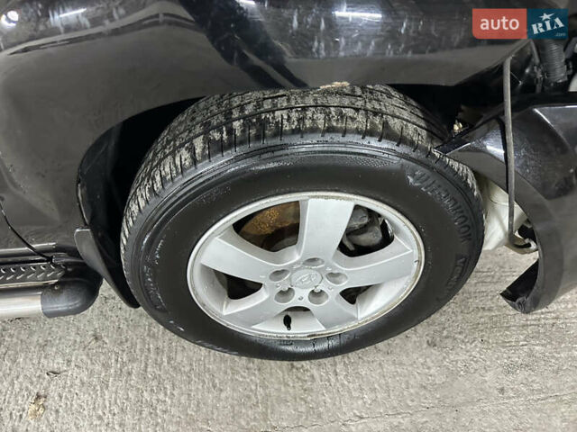 Чорний Хендай Туксон, об'ємом двигуна 2 л та пробігом 252 тис. км за 3000 $, фото 21 на Automoto.ua
