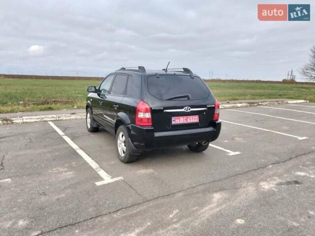 Черный Хендай Туксон, объемом двигателя 2 л и пробегом 127 тыс. км за 7590 $, фото 24 на Automoto.ua