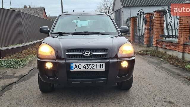 Черный Хендай Туксон, объемом двигателя 1.98 л и пробегом 277 тыс. км за 5350 $, фото 17 на Automoto.ua