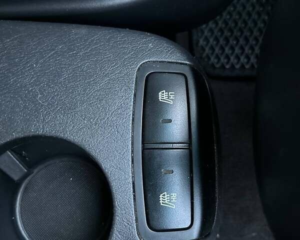 Черный Хендай Туксон, объемом двигателя 2 л и пробегом 235 тыс. км за 6700 $, фото 6 на Automoto.ua