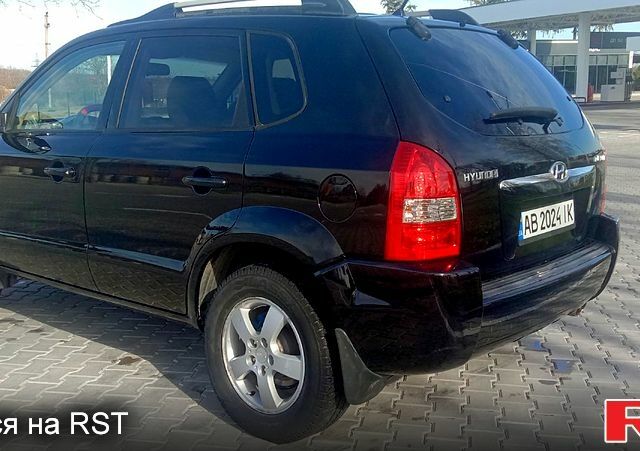 Черный Хендай Туксон, объемом двигателя 2 л и пробегом 260 тыс. км за 8000 $, фото 4 на Automoto.ua