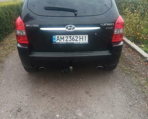 Черный Хендай Туксон, объемом двигателя 2 л и пробегом 231 тыс. км за 8000 $, фото 8 на Automoto.ua