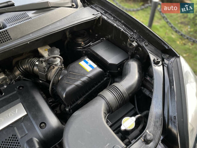 Чорний Хендай Туксон, об'ємом двигуна 1.98 л та пробігом 233 тис. км за 7650 $, фото 68 на Automoto.ua