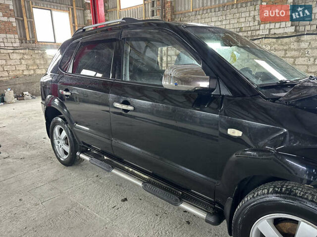 Чорний Хендай Туксон, об'ємом двигуна 2 л та пробігом 252 тис. км за 3000 $, фото 47 на Automoto.ua