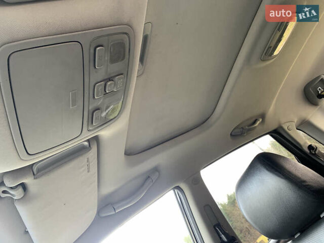 Черный Хендай Туксон, объемом двигателя 1.99 л и пробегом 290 тыс. км за 7700 $, фото 23 на Automoto.ua