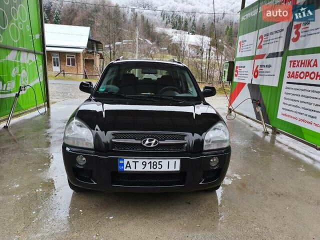 Чорний Хендай Туксон, об'ємом двигуна 2 л та пробігом 271 тис. км за 6599 $, фото 6 на Automoto.ua
