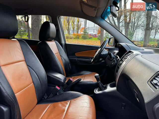 Черный Хендай Туксон, объемом двигателя 2 л и пробегом 210 тыс. км за 7990 $, фото 31 на Automoto.ua