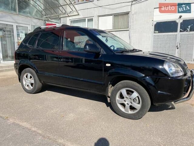 Чорний Хендай Туксон, об'ємом двигуна 2 л та пробігом 230 тис. км за 7300 $, фото 7 на Automoto.ua