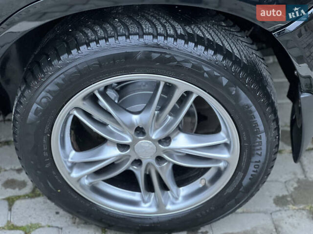 Чорний Хендай Туксон, об'ємом двигуна 1.98 л та пробігом 170 тис. км за 6999 $, фото 39 на Automoto.ua