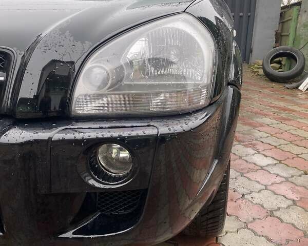 Чорний Хендай Туксон, об'ємом двигуна 1.98 л та пробігом 202 тис. км за 7350 $, фото 2 на Automoto.ua