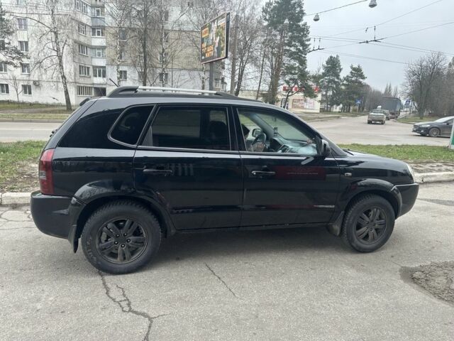 Черный Хендай Туксон, объемом двигателя 2 л и пробегом 174 тыс. км за 8000 $, фото 3 на Automoto.ua