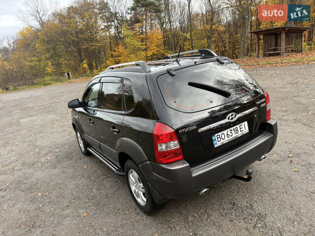 Хендай Туксон 2006 у Тернополі на Automoto.ua Чорний Хендай Туксон, об'ємом двигуна 1.99 л та пробігом 240 тис. км за 7600 $, фото 19 на Automoto.ua