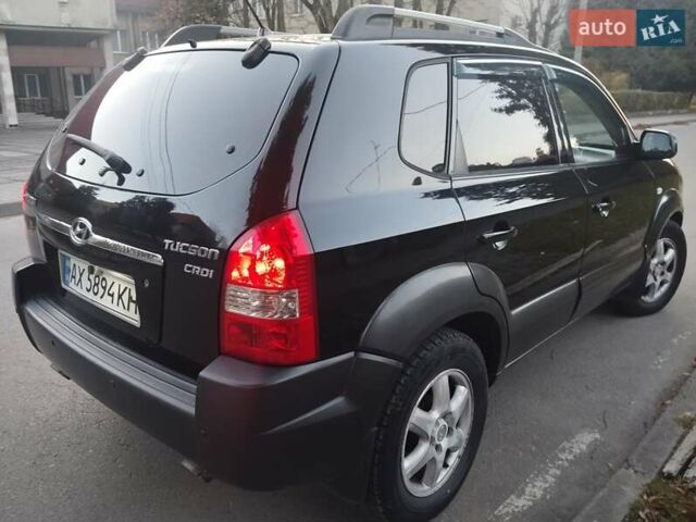 Чорний Хендай Туксон, об'ємом двигуна 1.99 л та пробігом 239 тис. км за 6990 $, фото 13 на Automoto.ua