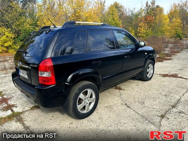 Черный Хендай Туксон, объемом двигателя 2 л и пробегом 250 тыс. км за 7500 $, фото 6 на Automoto.ua