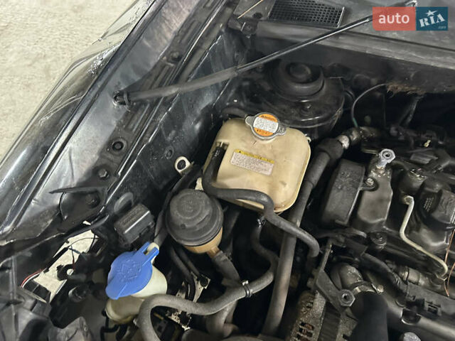 Чорний Хендай Туксон, об'ємом двигуна 2 л та пробігом 252 тис. км за 3000 $, фото 24 на Automoto.ua