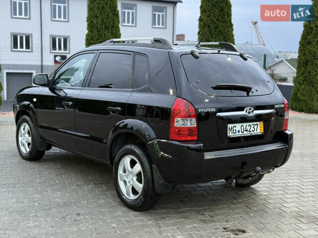 Чорний Хендай Туксон, об'ємом двигуна 2 л та пробігом 204 тис. км за 7750 $, фото 8 на Automoto.ua