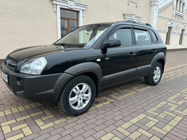 Черный Хендай Туксон, объемом двигателя 2 л и пробегом 220 тыс. км за 7200 $, фото 7 на Automoto.ua