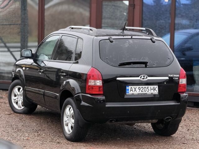 Черный Хендай Туксон, объемом двигателя 2 л и пробегом 263 тыс. км за 7950 $, фото 6 на Automoto.ua