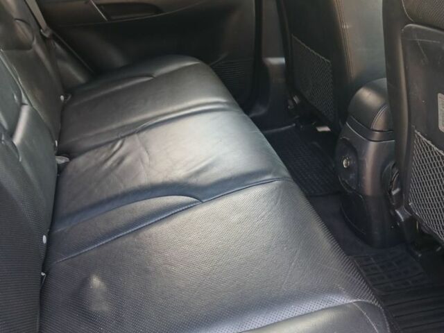 Черный Хендай Туксон, объемом двигателя 2 л и пробегом 266 тыс. км за 7700 $, фото 6 на Automoto.ua