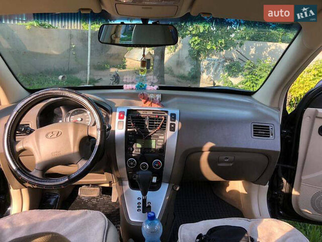 Хендай Туксон 2006 в Черкассах на Automoto.ua Черный Хендай Туксон, объемом двигателя 2 л и пробегом 190 тыс. км за 8000 $, фото 3 на Automoto.ua