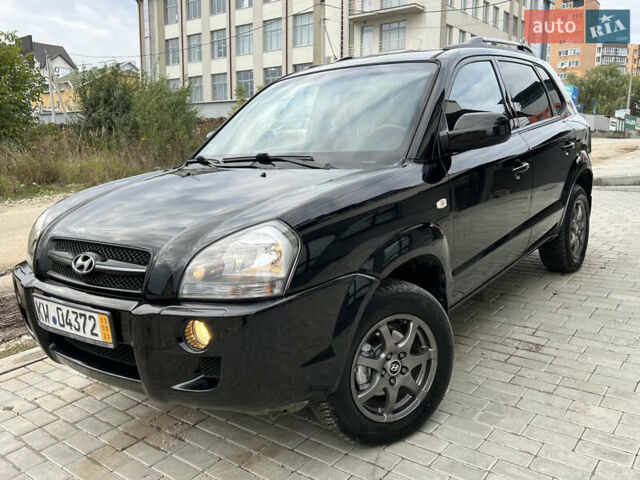 Чорний Хендай Туксон, об'ємом двигуна 2 л та пробігом 144 тис. км за 6599 $, фото 2 на Automoto.ua