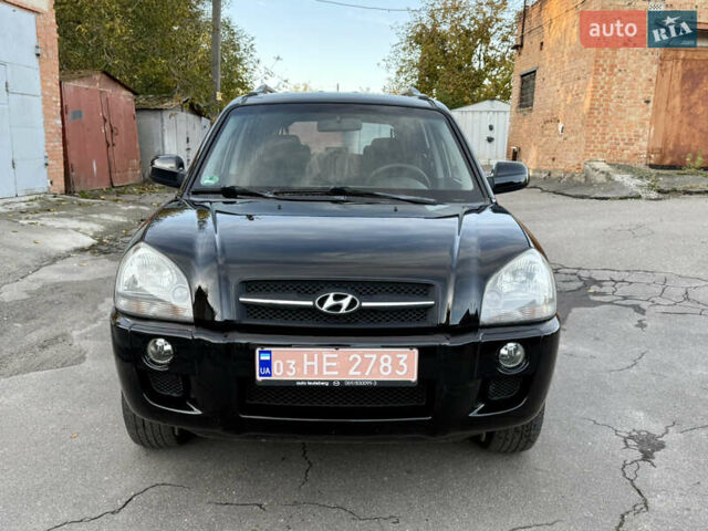 Черный Хендай Туксон, объемом двигателя 2 л и пробегом 189 тыс. км за 7150 $, фото 11 на Automoto.ua