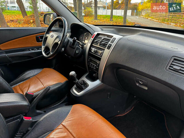 Черный Хендай Туксон, объемом двигателя 2 л и пробегом 210 тыс. км за 7990 $, фото 29 на Automoto.ua