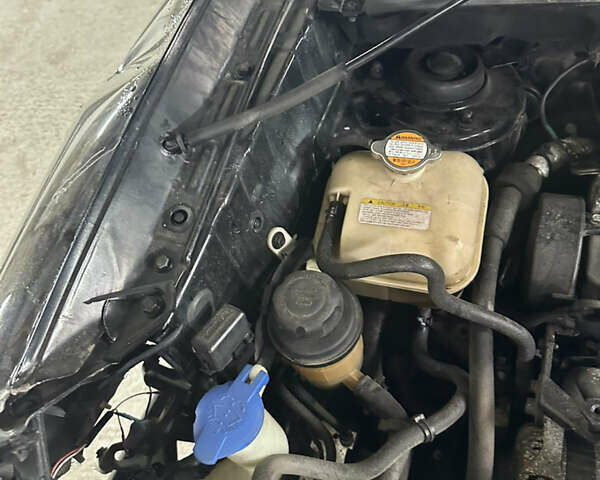 Чорний Хендай Туксон, об'ємом двигуна 2 л та пробігом 252 тис. км за 3000 $, фото 26 на Automoto.ua