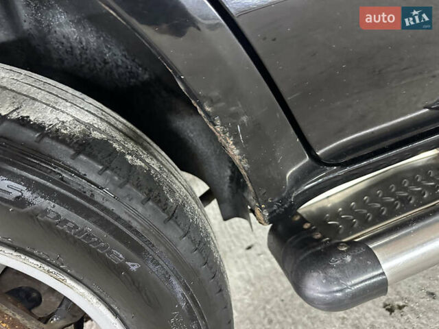 Чорний Хендай Туксон, об'ємом двигуна 2 л та пробігом 252 тис. км за 3000 $, фото 38 на Automoto.ua