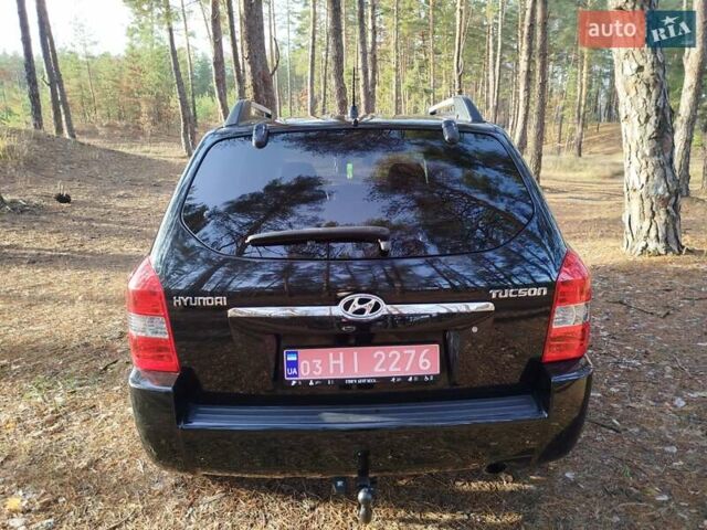 Чорний Хендай Туксон, об'ємом двигуна 1.98 л та пробігом 195 тис. км за 8200 $, фото 9 на Automoto.ua