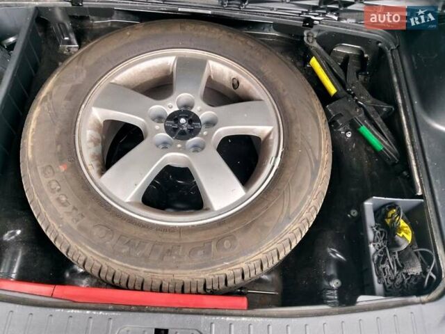Черный Хендай Туксон, объемом двигателя 2 л и пробегом 127 тыс. км за 7590 $, фото 46 на Automoto.ua