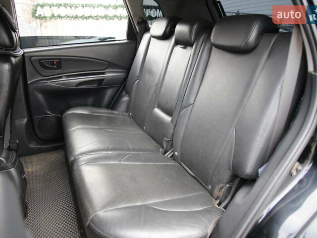 Черный Хендай Туксон, объемом двигателя 2.66 л и пробегом 217 тыс. км за 8600 $, фото 7 на Automoto.ua