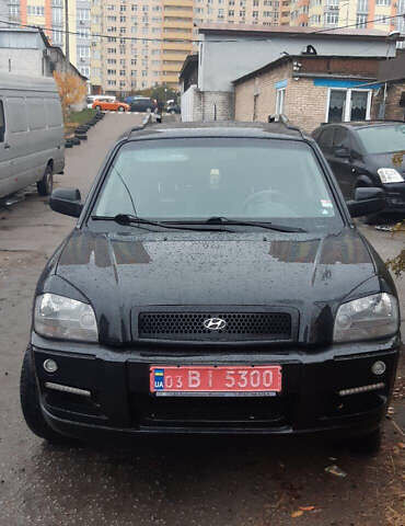 Чорний Хендай Туксон, об'ємом двигуна 1.99 л та пробігом 243 тис. км за 8850 $, фото 4 на Automoto.ua